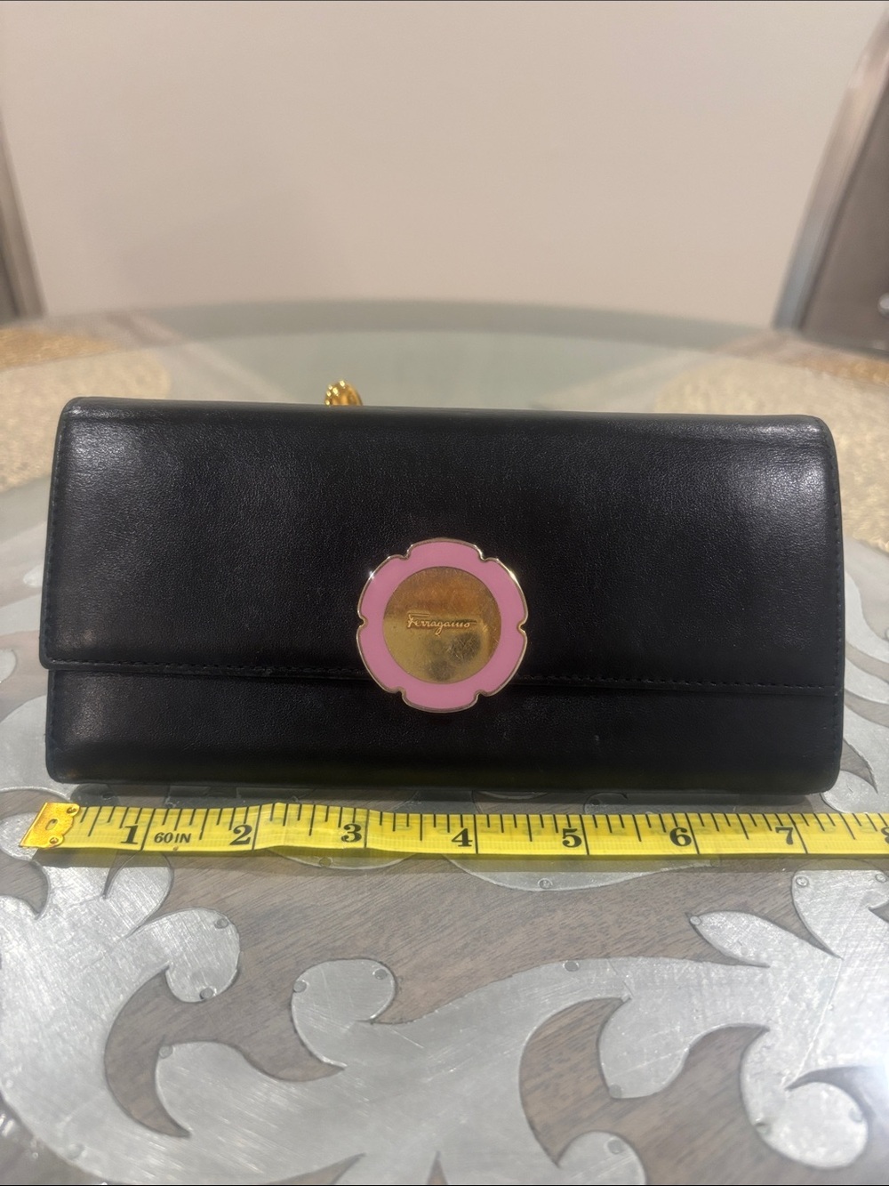 Salvatore Ferragamo Black Leather wallet with purple/gold medallion- M I Italy